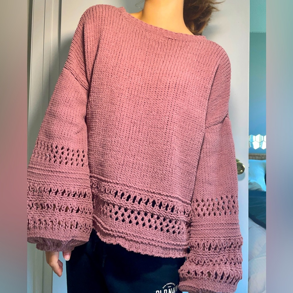 Dark pink knitted sweater with bishop sleeve